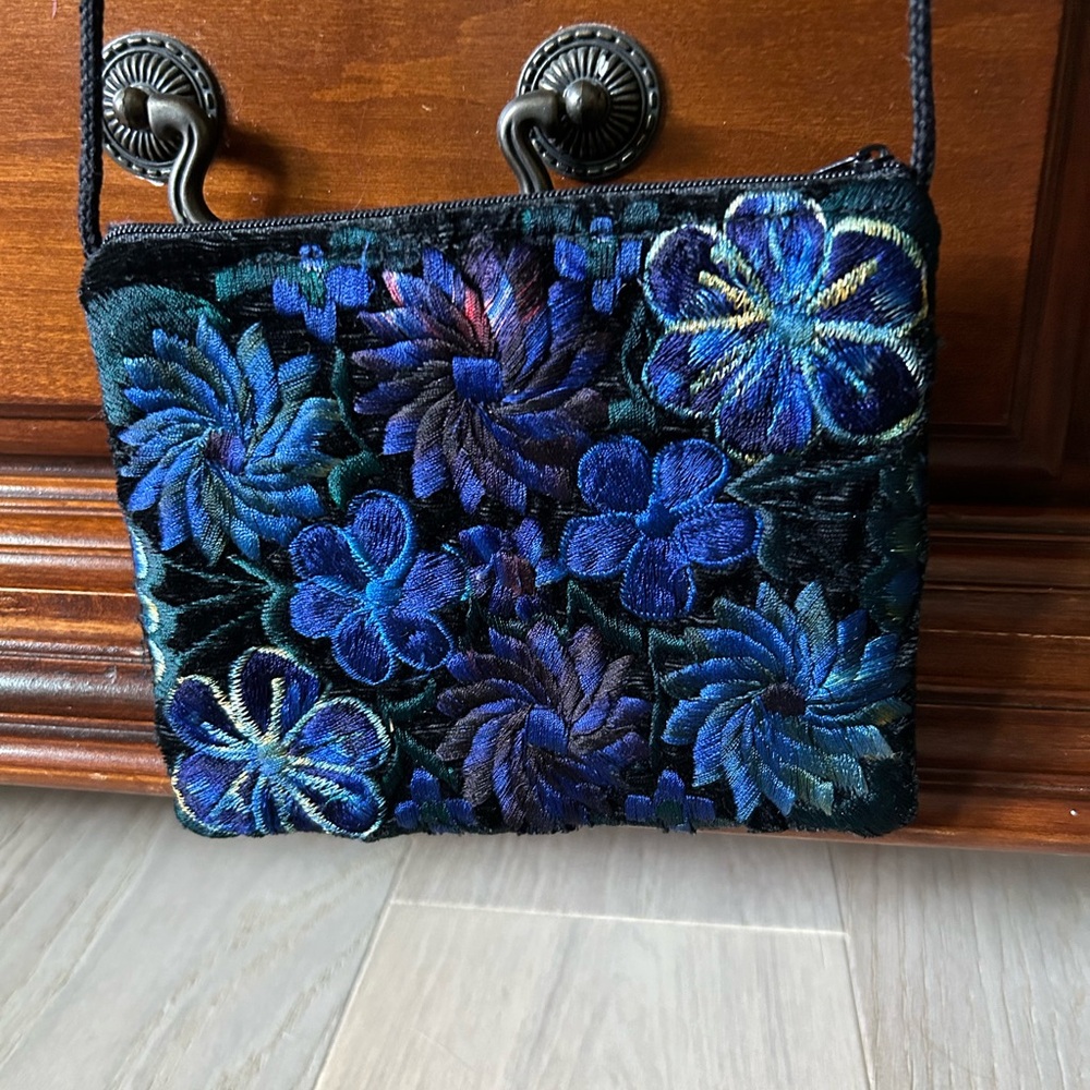 Handcrafted blue embroidered cross body/shoulder bag.